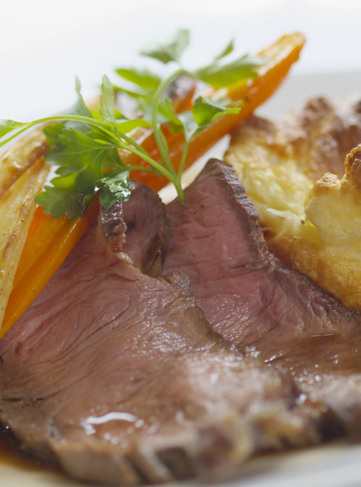 Roast beef with parsnips, carrots, Yorkshire pudding and gravy